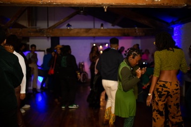 Guests gathering and dancing during an event at brwnbox